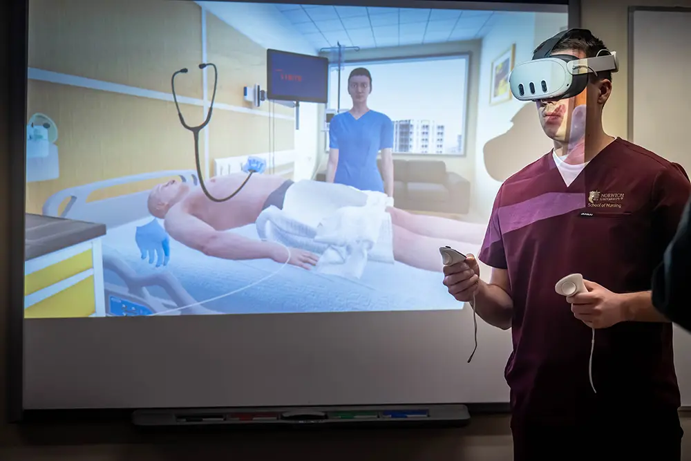 Norwich student in VR scenario in headset