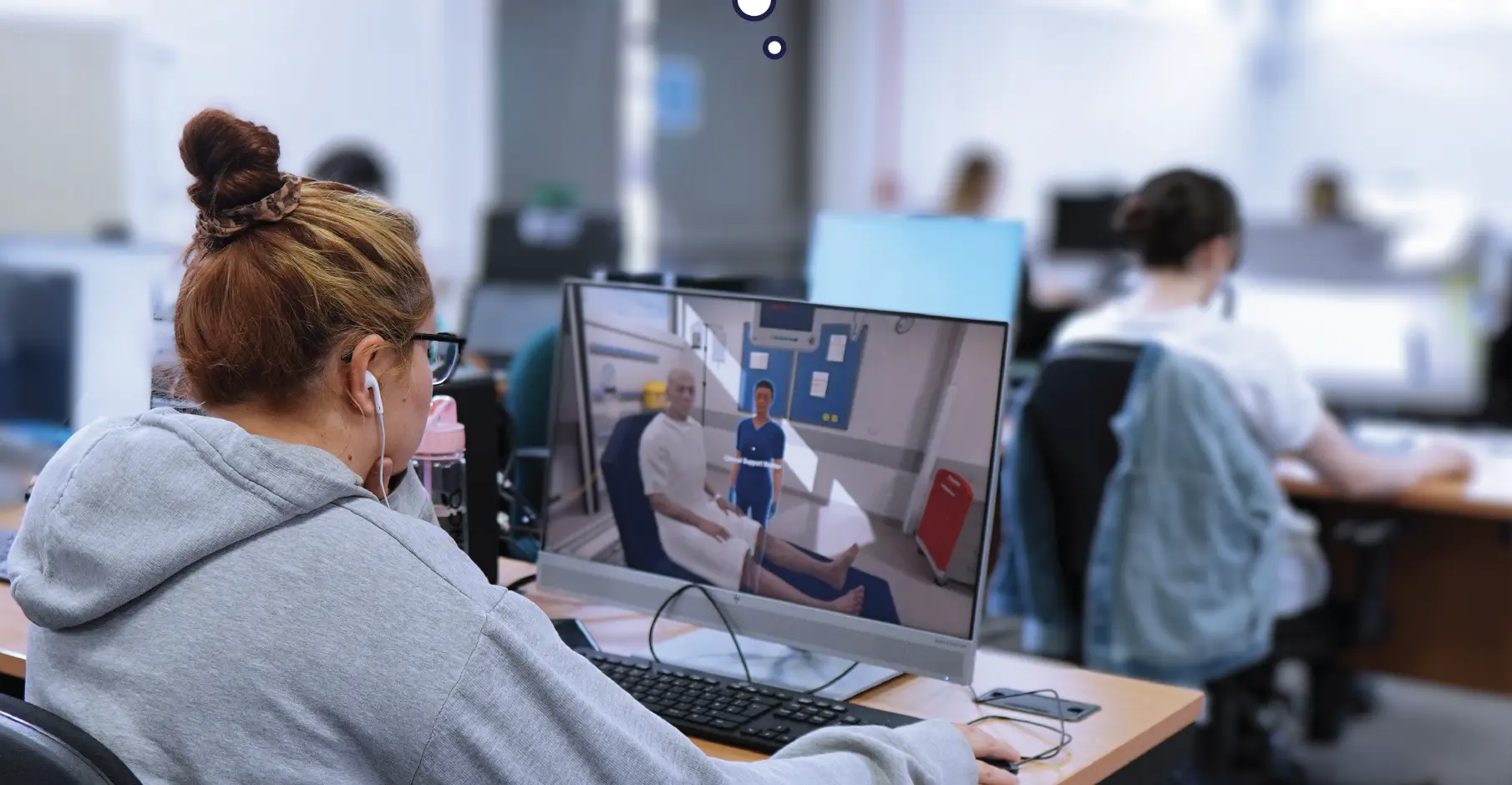 Student using OMS VR patient care simulation